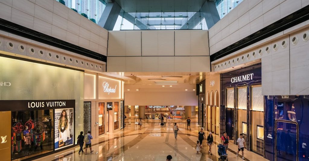 Explore the modern architecture of a luxury shopping mall in Hong Kong.